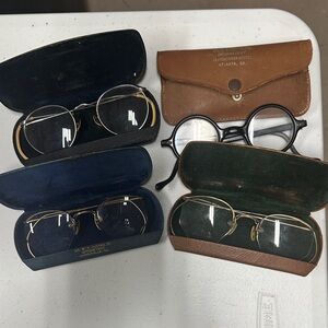 4 pair of very VINTAGE prescription eyeglasses.